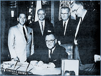 California Governor Edmond G. Brown with Forest Grunigen, M.D. on his far left and Joseph Cosentino, M.D. on his far right, obtaining support for Proposition 22 in 1962.